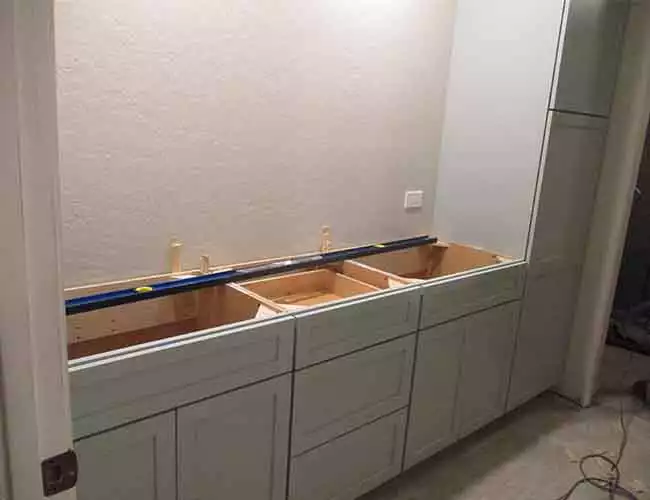 Vanities and Tall Cabinets before Countertop